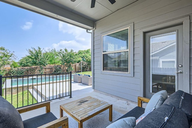 balcony with a ceiling fan, a patio area, and outdoor lounge area