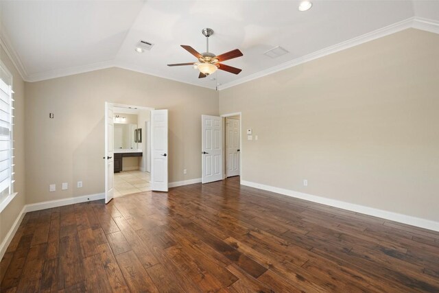 3109 Brigham Ct, Austin, TX 78732 - unfurnished bedroom featuring crown molding, vaulted ceiling, baseboards, dark wood-style floors, and ensuite bathroom