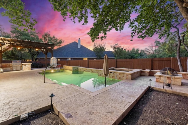 3109 Brigham Ct, Austin, TX 78732 - view of pool with a patio, a fenced backyard, a fenced in pool, exterior kitchen, and an outdoor fire pit