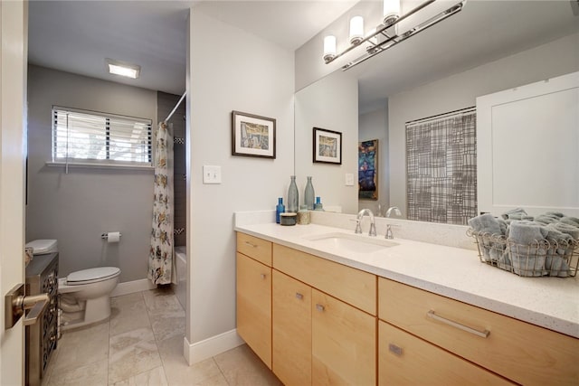4411 Bilboa Dr, Austin, TX 78759 - bathroom with toilet, vanity, marble finish floors, baseboards, and shower / bathtub combination with curtain
