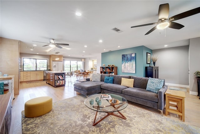 4411 Bilboa Dr, Austin, TX 78759 - living room featuring ceiling fan, recessed lighting, and light wood finished floors