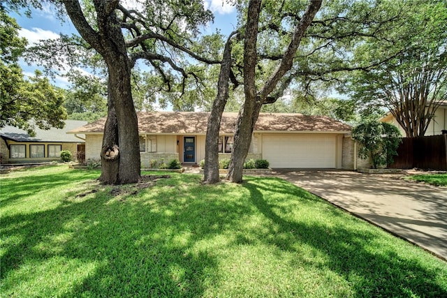 4411 Bilboa Dr, Austin, TX 78759 - ranch-style house featuring brick siding, concrete driveway, and a garage