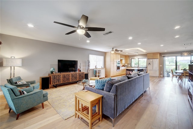 4411 Bilboa Dr, Austin, TX 78759 - living room featuring recessed lighting, a ceiling fan, and light wood-style flooring