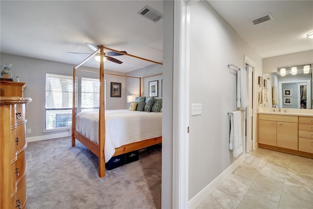 4411 Bilboa Dr, Austin, TX 78759 - bedroom featuring baseboards, connected bathroom, and ceiling fan