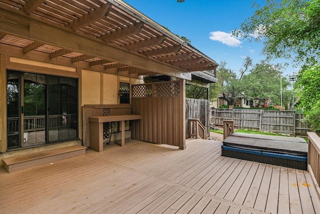 deck featuring fence and a pergola