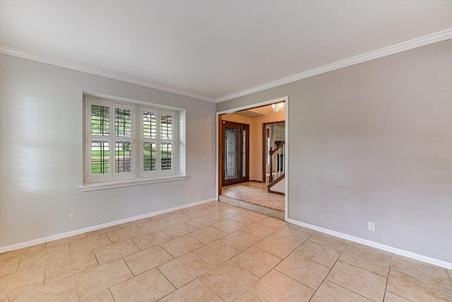 unfurnished room featuring baseboards, ornamental molding, light tile patterned floors, and stairway