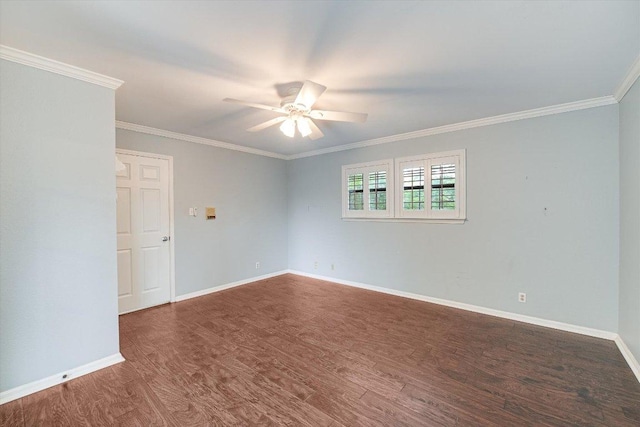 empty room featuring ornamental molding, ceiling fan, and wood finished floors