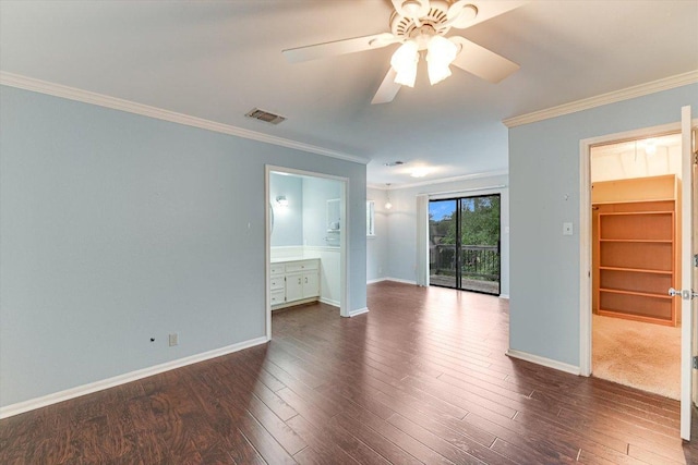 unfurnished bedroom featuring visible vents, ornamental molding, and baseboards