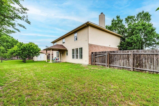 1500 Mexican Heather Ct, Pflugerville, TX 78660 - rear view of house featuring a chimney and brick siding