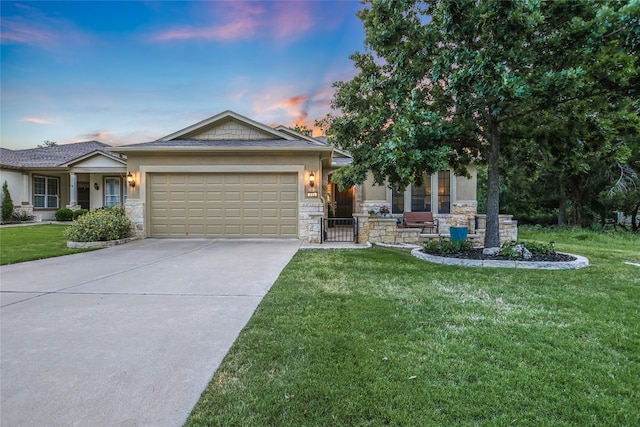 712 Independence Creek Ln, Georgetown, TX 78633 - view of front of home featuring an attached garage, driveway, and stone siding