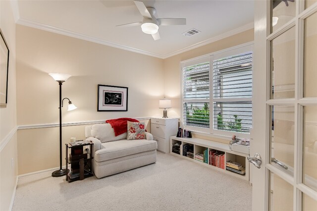 712 Independence Creek Ln, Georgetown, TX 78633 - living area featuring ceiling fan, visible vents, ornamental molding, and carpet