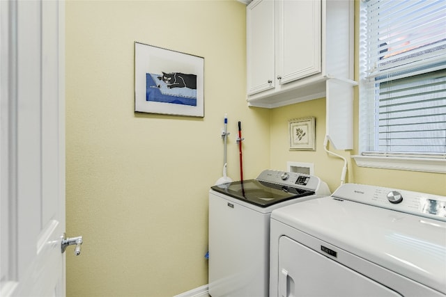 712 Independence Creek Ln, Georgetown, TX 78633 - laundry room featuring separate washer and dryer, cabinet space, and a wealth of natural light