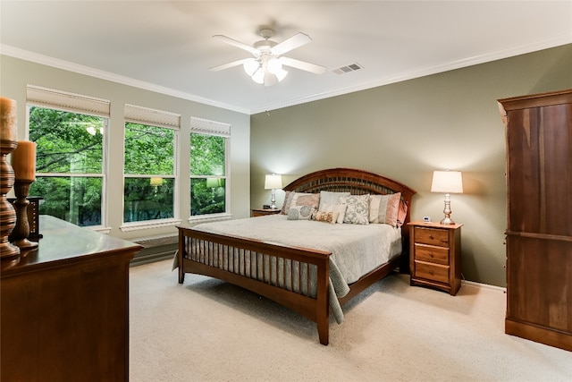 712 Independence Creek Ln, Georgetown, TX 78633 - bedroom featuring crown molding, multiple windows, light colored carpet, and visible vents