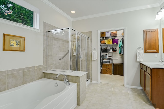 712 Independence Creek Ln, Georgetown, TX 78633 - full bath with ornamental molding, a shower stall, a walk in closet, and a bath