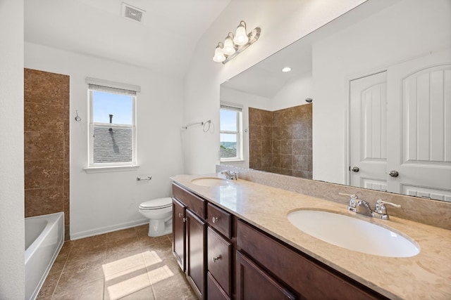 bathroom featuring visible vents, a sink, and a healthy amount of sunlight