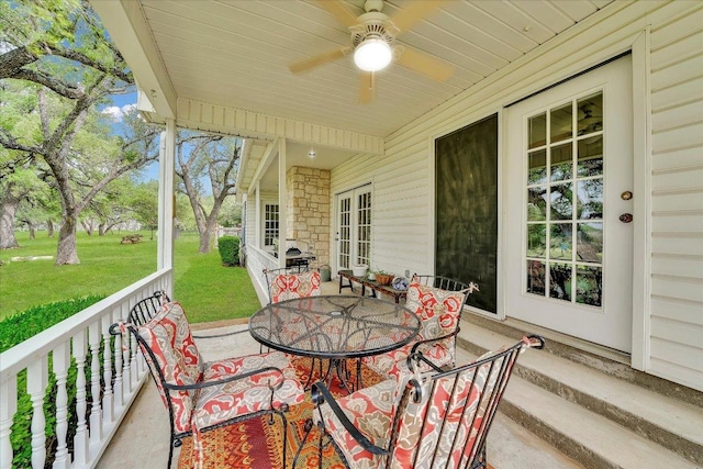 view of patio / terrace featuring ceiling fan and outdoor dining space