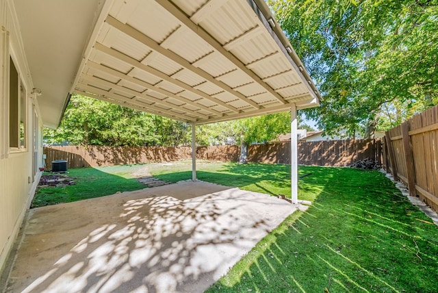 10429 Firethorn Ln, Austin, TX 78750 - view of yard featuring a patio, central AC unit, and a fenced backyard