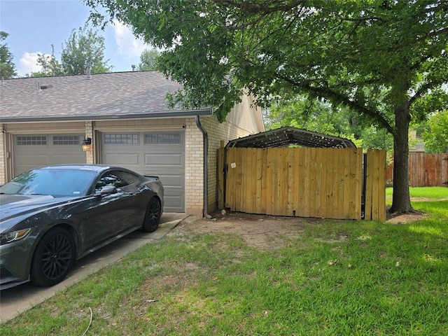 garage featuring fence