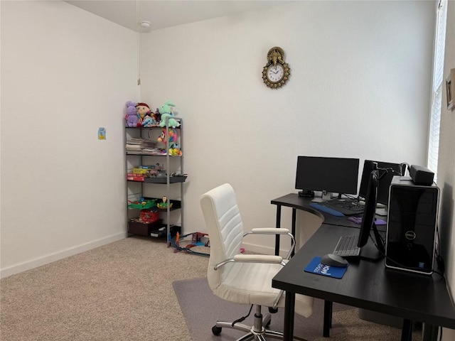 office featuring carpet floors and baseboards
