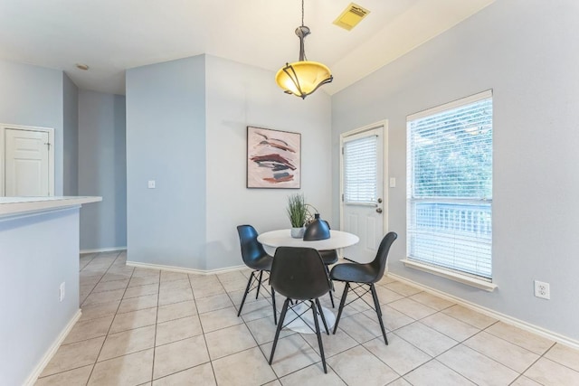 7418 W Magic Mountain Ln, Round Rock, TX 78681 - dining room with baseboards, light tile patterned floors, and visible vents