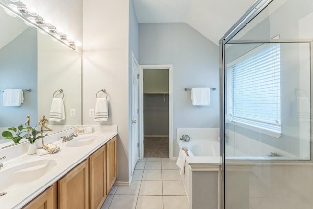 7418 W Magic Mountain Ln, Round Rock, TX 78681 - full bathroom featuring tile patterned floors, vaulted ceiling, a garden tub, and a sink