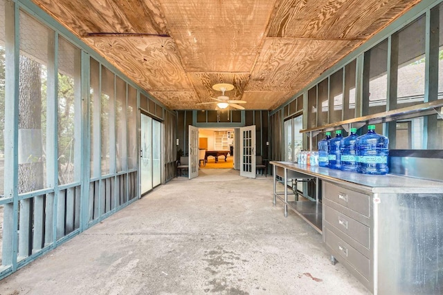 interior space featuring ceiling fan