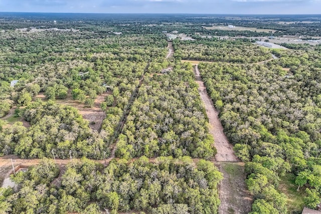aerial view featuring a forest view