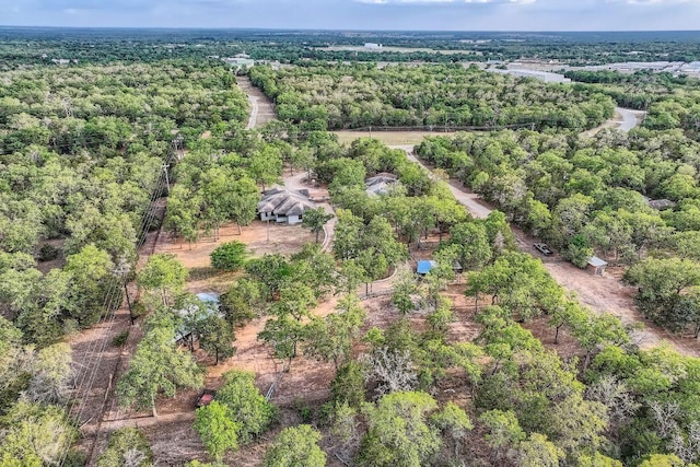 aerial view with a wooded view