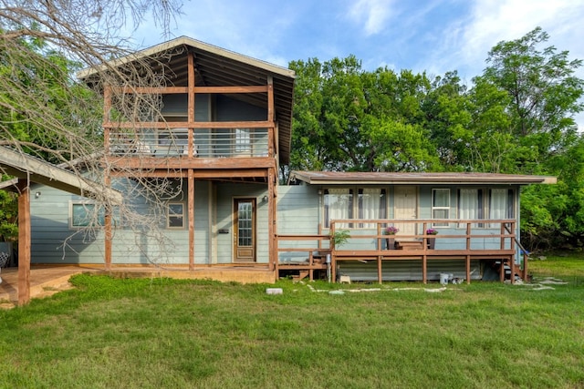 2401 De Soto Dr, Austin, TX 78733 - rear view of property featuring a yard and a balcony