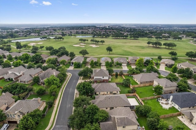 bird's eye view featuring a water view, a residential view, and golf course view