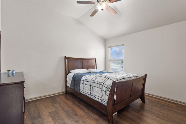 bedroom with a ceiling fan, baseboards, wood finished floors, and lofted ceiling
