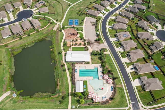 aerial view with a water view and a residential view