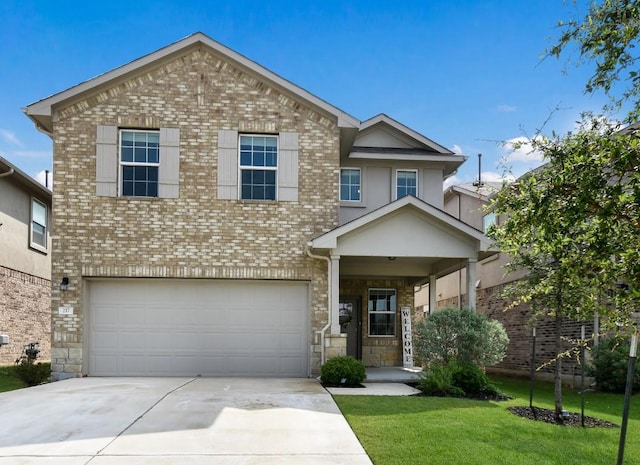 217 Frederick Dr, Georgetown, TX 78626 - view of front of home featuring driveway, a garage, a front yard, and brick siding