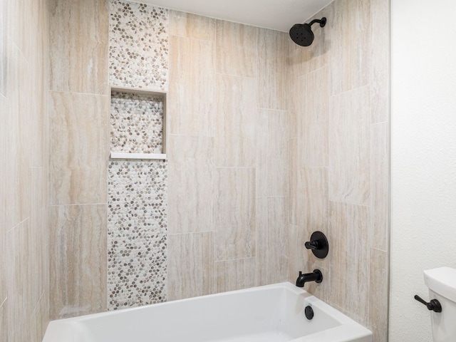 full bath with shower / bath combination and toilet