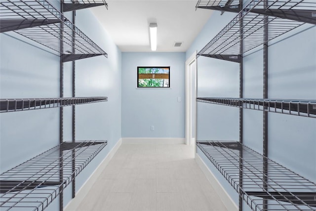 walk in closet featuring visible vents