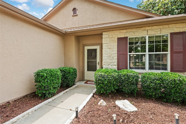 508 Texas Dr, Georgetown, TX 78633 - doorway to property featuring stucco siding and stone siding
