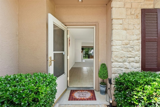 508 Texas Dr, Georgetown, TX 78633 - doorway to property featuring stucco siding and stone siding