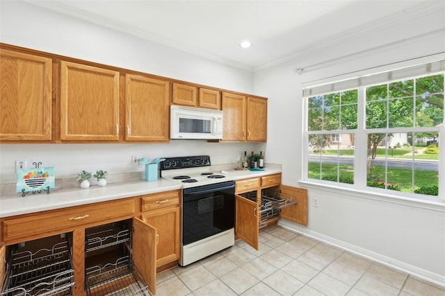 508 Texas Dr, Georgetown, TX 78633 - kitchen featuring white appliances, crown molding, light countertops, brown cabinetry, and light tile patterned floors