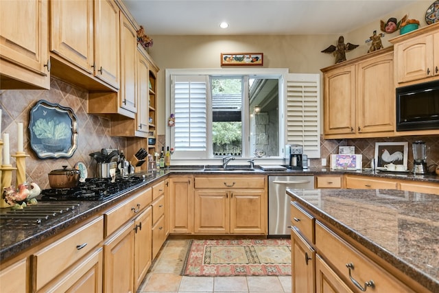 2305 Barton Creek Blvd Unit 28, Austin, TX 78735 - kitchen featuring black microwave, decorative backsplash, stainless steel dishwasher, and dark stone countertops