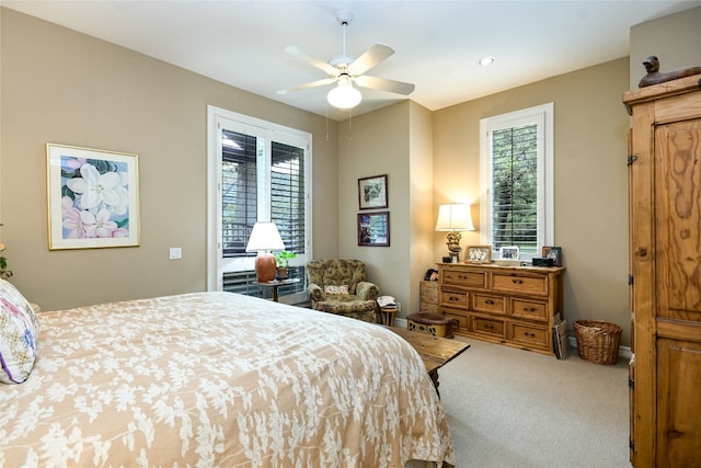 2305 Barton Creek Blvd Unit 28, Austin, TX 78735 - bedroom with a ceiling fan and carpet