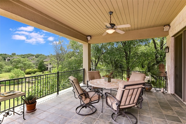 2305 Barton Creek Blvd Unit 28, Austin, TX 78735 - view of patio featuring a ceiling fan, outdoor dining space, and a balcony