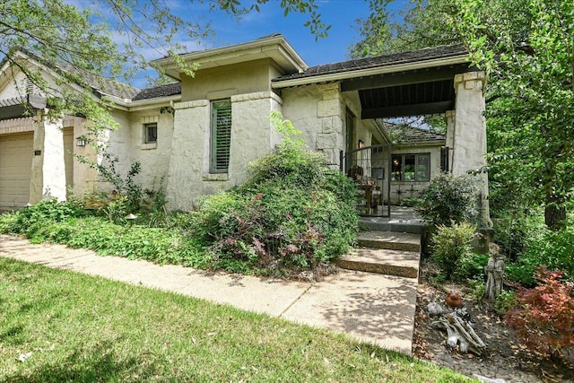 2305 Barton Creek Blvd Unit 28, Austin, TX 78735 - exterior space with a garage and stucco siding