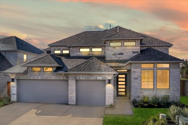 1400 Mulberry Oak Ln, Georgetown, TX 78628 - view of front facade with an attached garage, a shingled roof, driveway, and stone siding