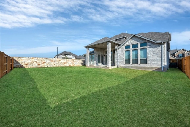 1400 Mulberry Oak Ln, Georgetown, TX 78628 - rear view of property with brick siding
