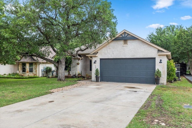 ranch-style house featuring a front lawn, concrete driveway, an attached garage, stone siding, and stucco siding