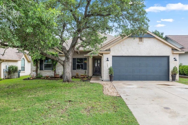 single story home featuring an attached garage, stucco siding, driveway, and a front yard