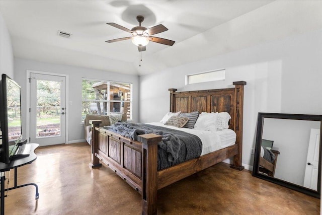 bedroom featuring baseboards, visible vents, finished concrete floors, and access to exterior