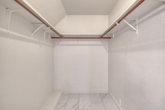 15203 Dormax Cir, Leander, TX 78641 - spacious closet featuring light marble finish floors
