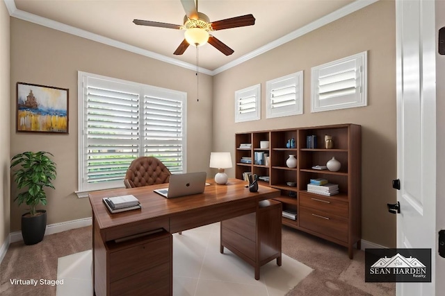 office area featuring light colored carpet, crown molding, baseboards, and ceiling fan