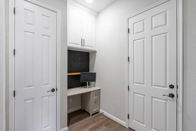 112 Bittik Cv, Georgetown, TX 78628 - unfurnished office featuring light wood finished floors and built in desk